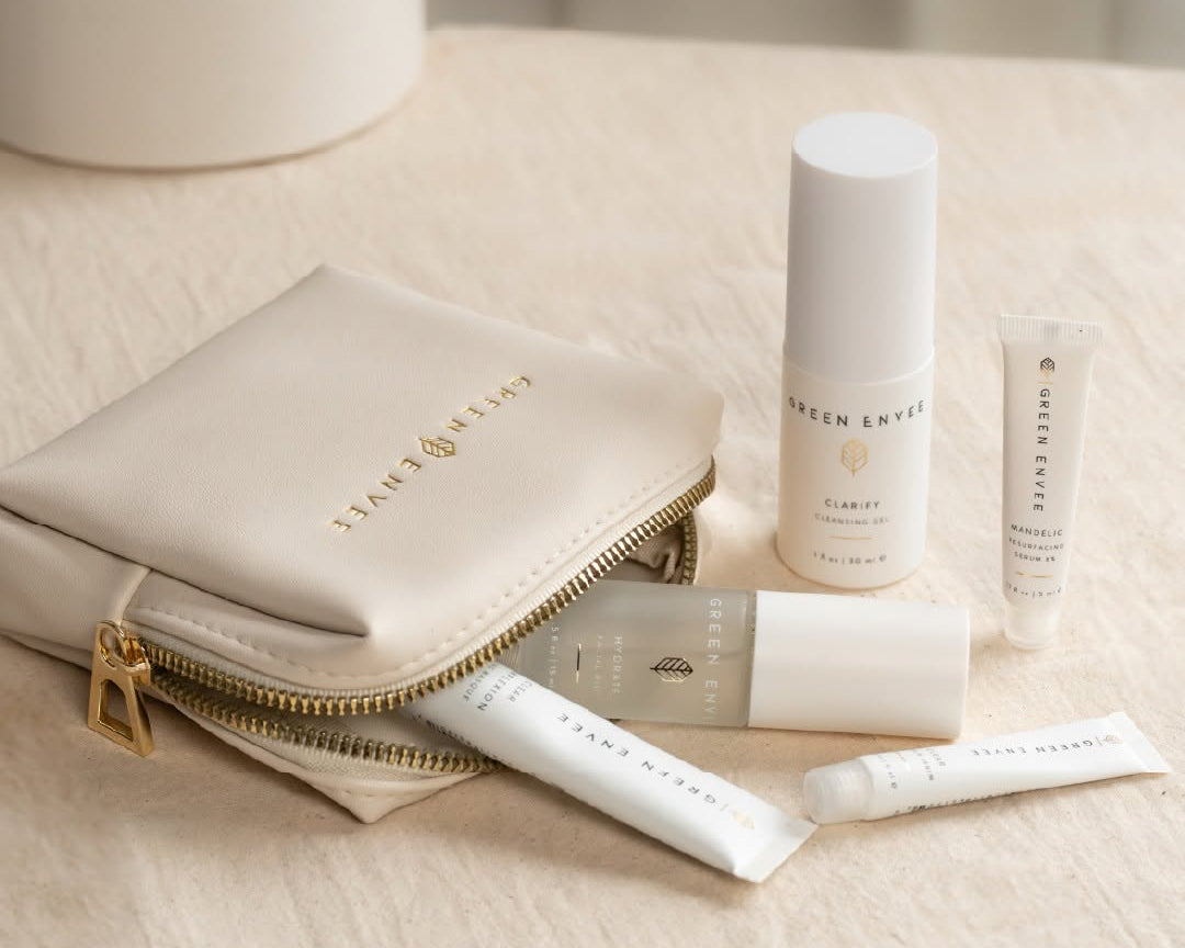 Cosmetic bag with skincare products on a neutral background