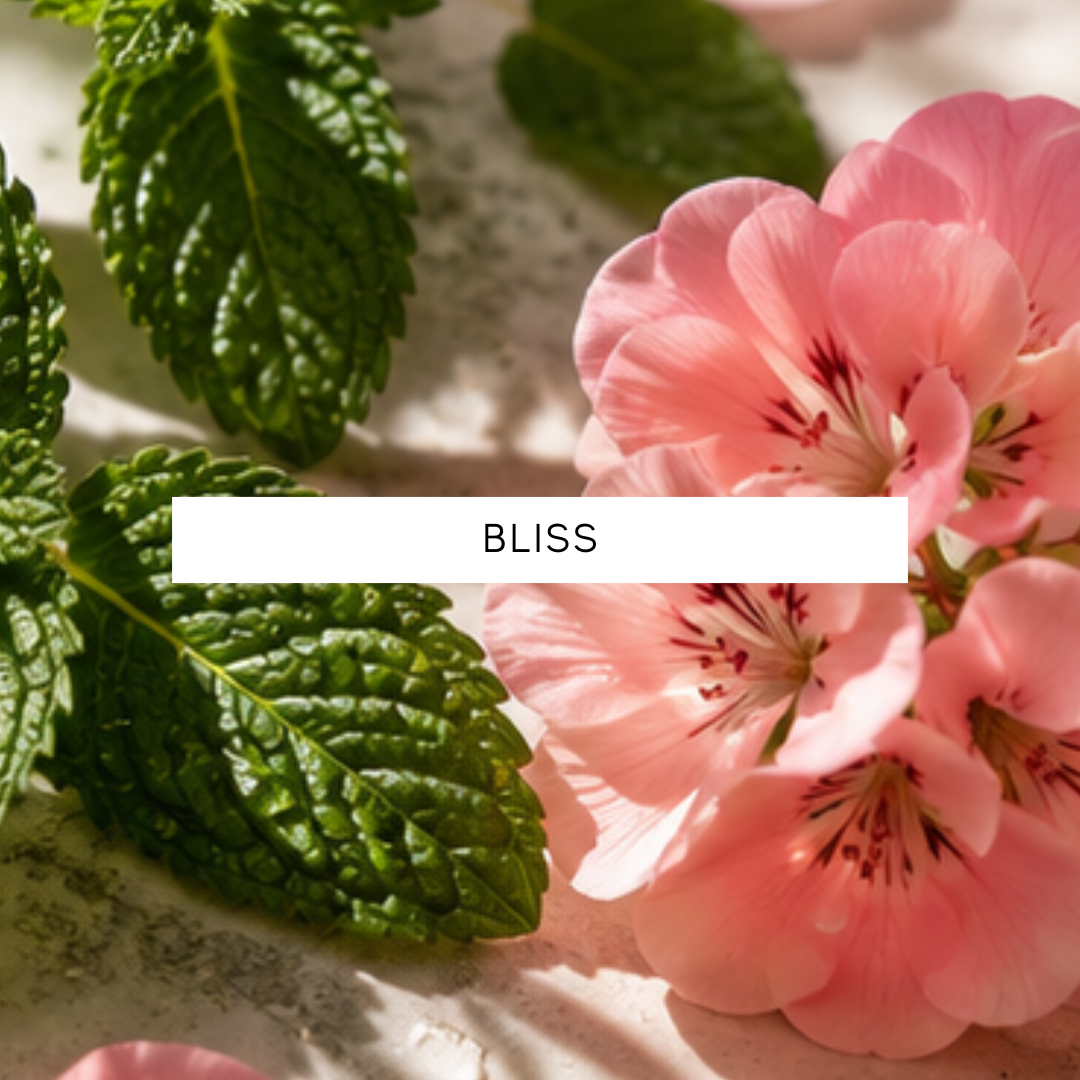 Pink flowers with green leaves and the word 'BLISS' in the center.