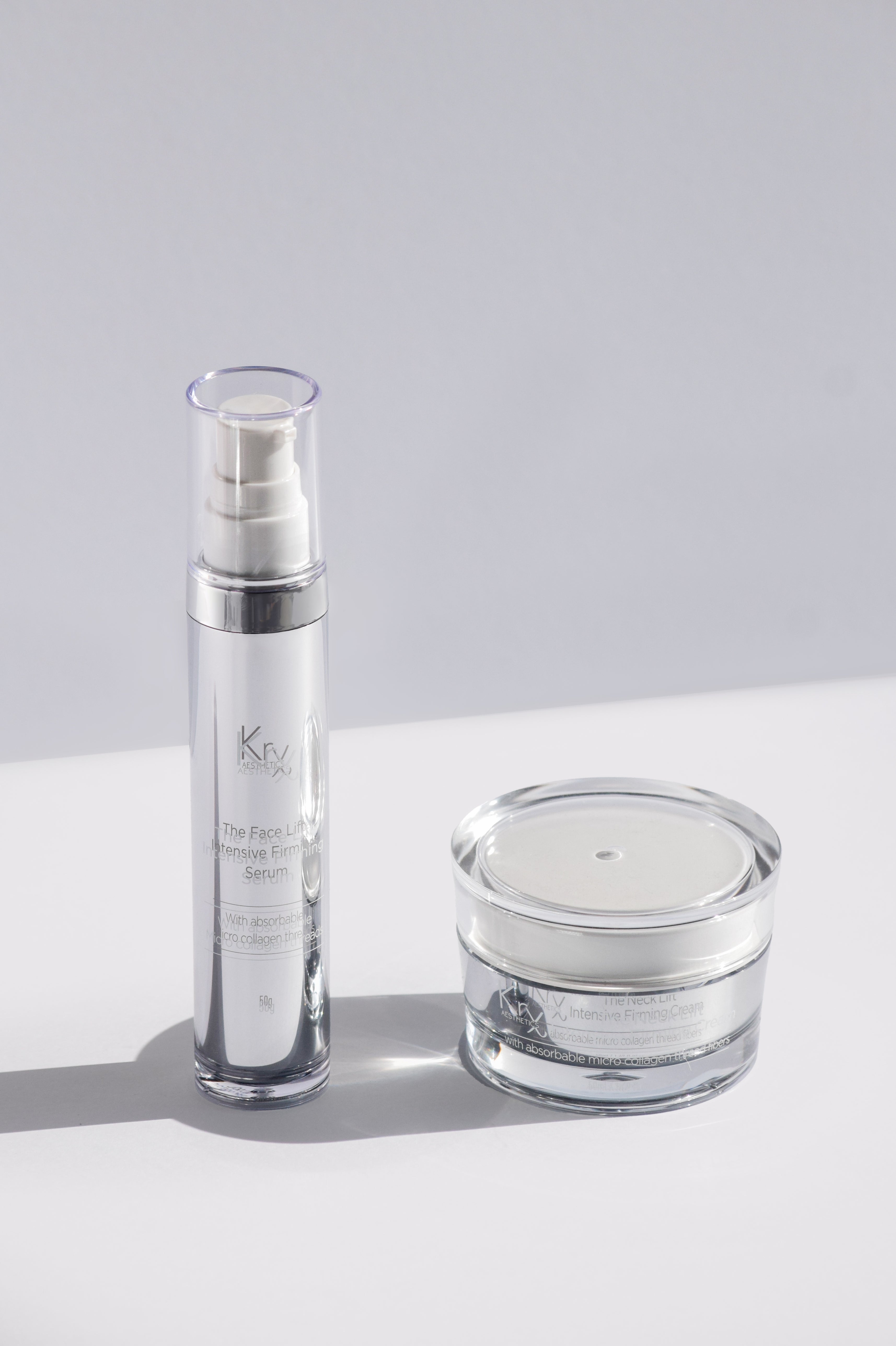 Skincare bottle and jar on a light gray background